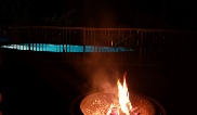 Camp Fire at Night Beside Pool
